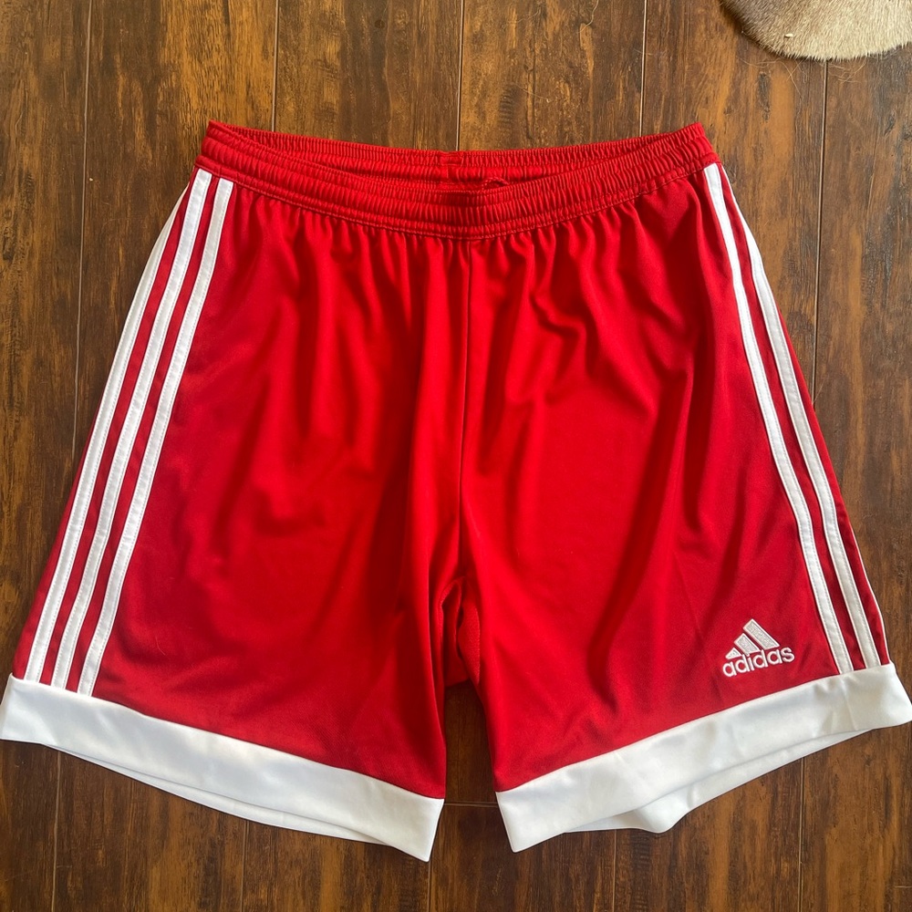 Red adidas shorts